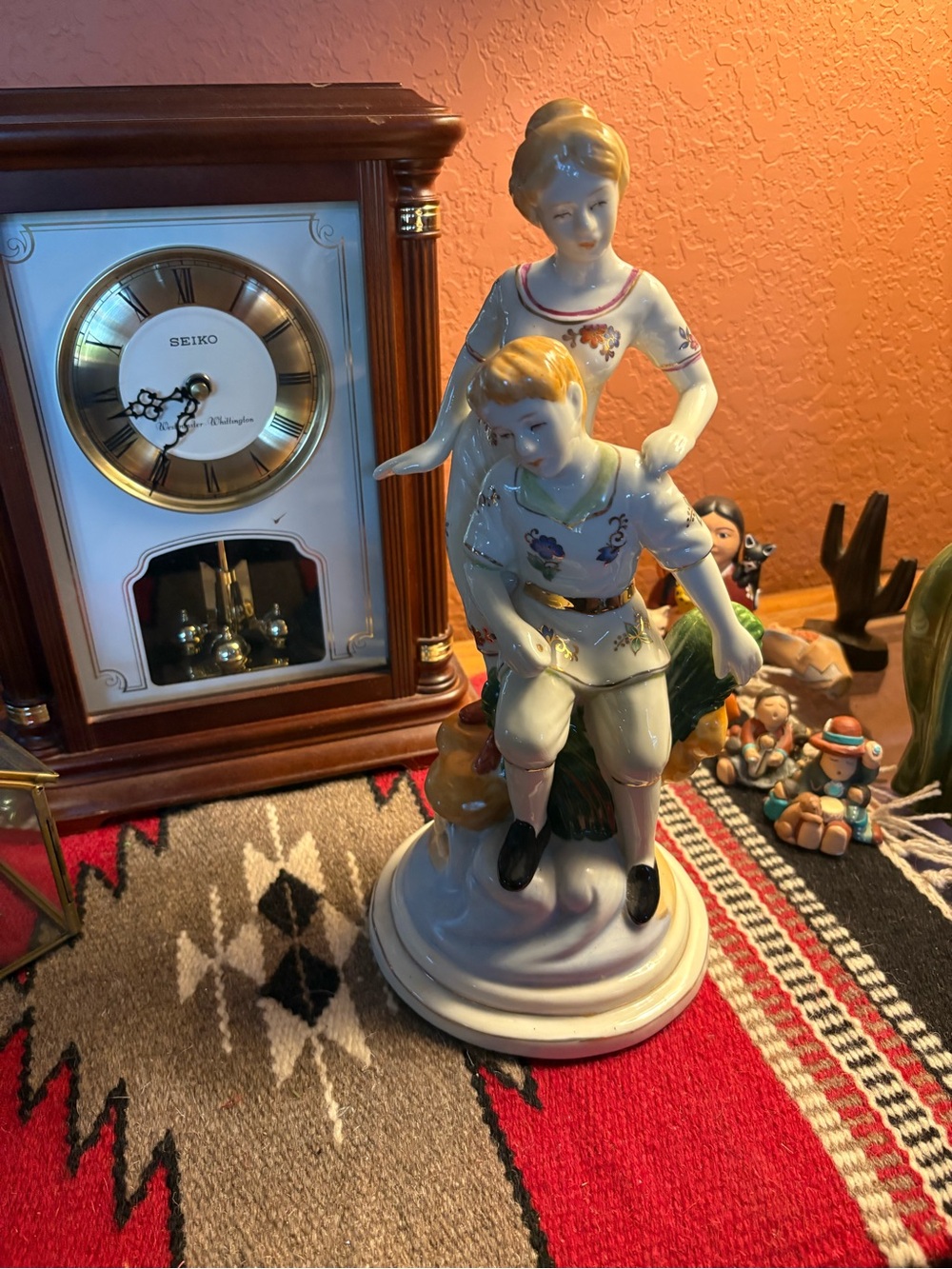 Limoges Porcelain Figurine Pair in White, Green, Gold and Pink Accents